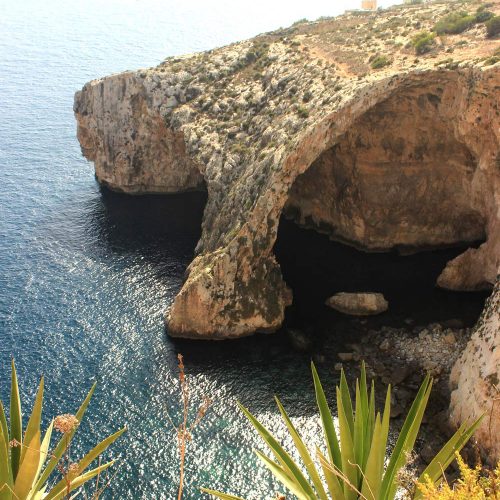 Blue Grotto Rock In Sea